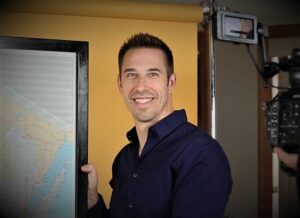 Foster Care Coordinator Standing by Wisconsin Map