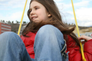 girl on the swing zk4JNuPO SBI 300199687 1 scaled