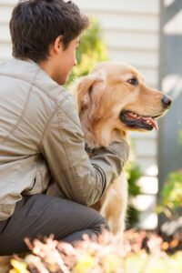 boy with dog at home 